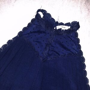 Navy blue laced top
Worn twice 
Size M
$8